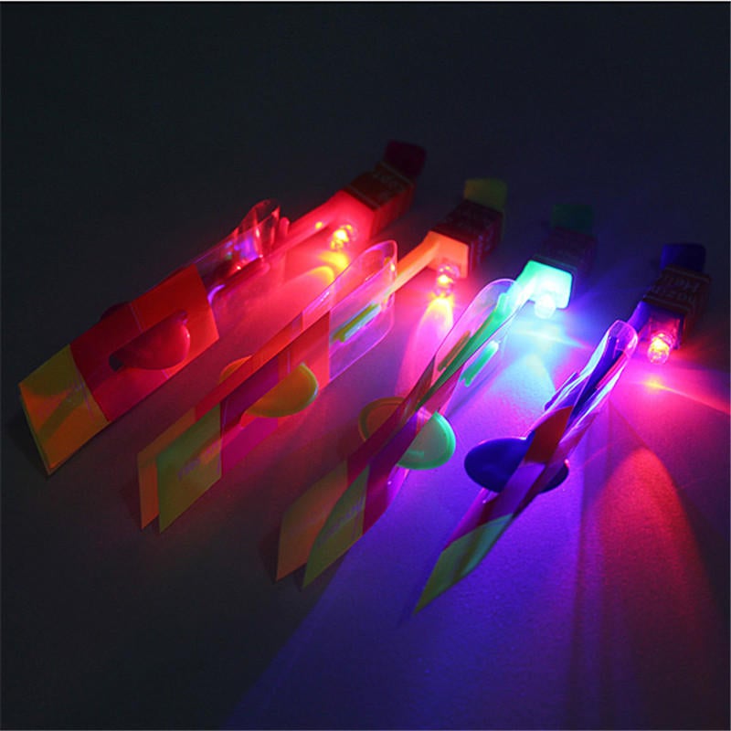 Amazing Flash LED Light Arrow Rocket Helicopter Rotating Flying Toy Party Fun Kids Outdoor Plane Toy